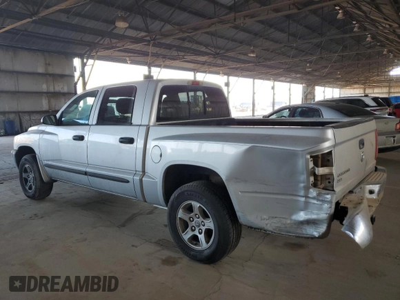 2005 Dodge Dakota SLT with VIN 1D7HE48K15S112874, listed as a Copart auction lot 42560405 with 194,887 mi miles and Salvage Title. Bid and sale history available at DreamBid. Image 2.