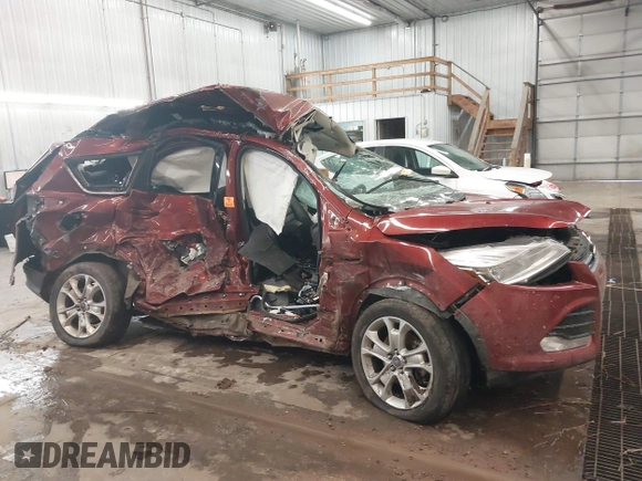2016 Ford Escape Titanium with VIN 1FMCU9JXXGUA53238, listed as a IAAI auction lot 38472772 with Not Provided miles and . Bid and sale history available at DreamBid. Image 12.