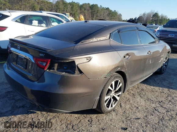 2016 Nissan Maxima Platinum with VIN 1N4AA6AP4GC434534, listed as a IAAI auction lot 41642540 with 143,413 mi miles and . Bid and sale history available at DreamBid. Image 4.