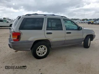 2003 Jeep Grand Cherokee Laredo with VIN 1J4GX48S13C609036, listed as a Copart auction lot 63143505 with 127,188 mi miles and Clean title. Bid and sale history available at DreamBid. Image 3.