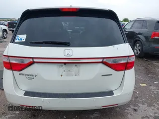2013 Honda Odyssey Touring with VIN 5FNRL5H96DB074819, listed as a IAAI auction lot 41898358 with 123,428 mi miles and . Bid and sale history available at carsss.com. Image 16.