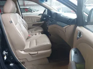 2007 Honda Odyssey EX-L z VIN 5FNRL38787B050884, wystawiony jako IAAI lot #41930632 z przebiegiem 204 452 mil mil oraz . Historia ofert i sprzedaży dostępna na DreamBid. Obrazek 5.