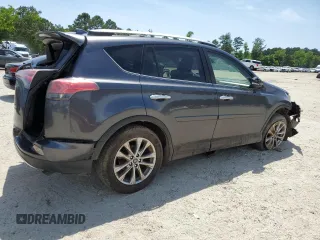 2016 Toyota RAV4 Limited z VIN JTMDFREVXGJ076533, wystawiony jako Copart lot #57480995 z przebiegiem 124 626 mil mil oraz Szkoda całkowita • Salvage title. Historia ofert i sprzedaży dostępna na DreamBid. Obrazek 3.