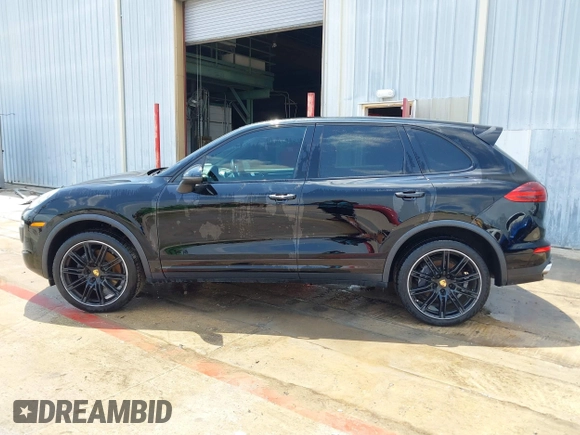2016 Porsche Cayenne with VIN WP1AA2A27GKA14200, listed as a IAAI auction lot 41959997 with 102,049 mi miles and . Bid and sale history available at DreamBid. Image 14.