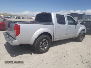 2016 Nissan Frontier S with VIN 1N6AD0EV8GN721786, listed as a Copart auction lot 54417415 with 100,672 mi miles and Salvage title. Bid and sale history available at DreamBid. Image 3.