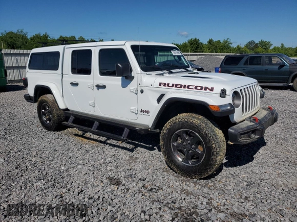 2023 Jeep Gladiator Rubicon with VIN 1C6JJTBG9PL546437, listed as a Copart auction lot 55516685 with 14,106 mi miles and Salvage title. Bid and sale history available at DreamBid. Image 4.