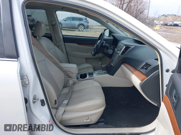 2014 Subaru Outback Limited with VIN 4S4BRBLCXE3313154, listed as a IAAI auction lot 41830358 with 127,652 mi miles and . Bid and sale history available at DreamBid. Image 5.