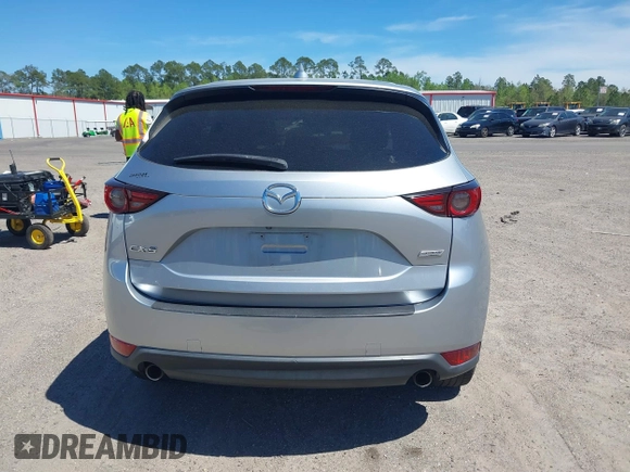 2019 Mazda CX-5 Grand Touring with VIN JM3KFADM1K1606082, listed as a IAAI auction lot 41875878 with 66,089 mi miles. Bid and sale history available at carsss.com. Image 16.
