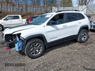2022 Jeep Cherokee Trailhawk with VIN 1C4PJMBX0ND545659, listed as a IAAI auction lot 41985121 with 26,397 mi miles. Bid and sale history available at carsss.com. Image 2.