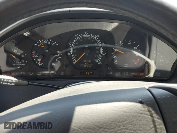 1997 Mercedes-Benz SL 500 with VIN WDBFA63F5VF143197, listed as a Copart auction lot 45003735 with 100,252 mi miles and Salvage title. Bid and sale history available at DreamBid. Image 9.