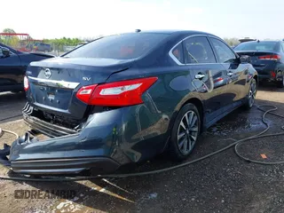2016 Nissan Altima SR with VIN 1N4AL3AP1GC204703, listed as a IAAI auction lot 42040016 with 88,304 mi miles and . Bid and sale history available at DreamBid. Image 4.