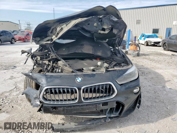 2018 BMW X2 sDrive28i z VIN WBXYJ3C32JEJ75705, wystawiony jako Copart lot #50643885 z przebiegiem 112 772 mil mil oraz Szkoda całkowita • Salvage title. Historia ofert i sprzedaży dostępna na DreamBid. Obrazek 5.