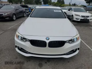 2015 BMW 4 Series 428i xDrive with VIN WBA4C9C59FD331372, listed as a Copart auction lot 58628665 with 81,245 mi miles and Salvage title. Bid and sale history available at DreamBid. Image 5.