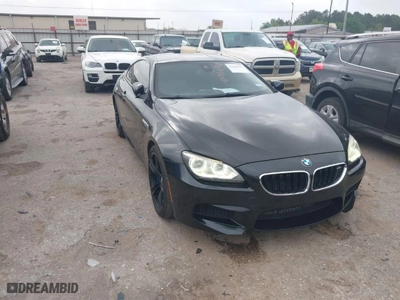 2013 BMW M6 with VIN WBSLX9C50DC968777, listed as a IAAI auction lot 41966918 with 113,458 mi miles. Bid and sale history available at carsss.com. Image 1.