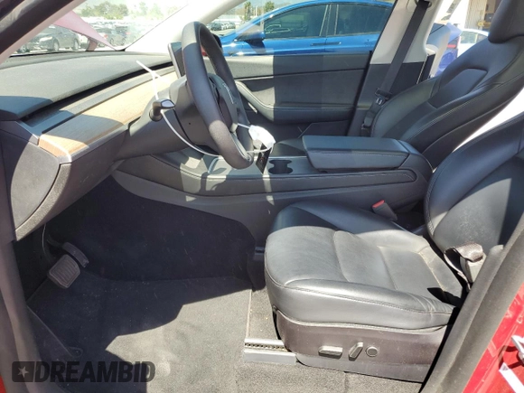 2021 Tesla Model Y Long Range with VIN 5YJYGDEE0MF217761, listed as a Copart auction lot 56525075 with 72,751 mi miles and Salvage Title. Bid and sale history available at DreamBid. Image 7.