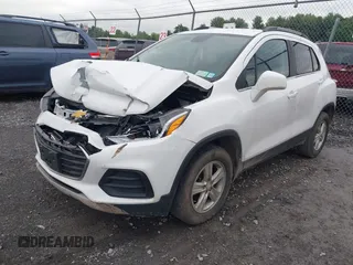 2020 Chevrolet Trax LT with VIN 3GNCJPSB1LL262562, listed as a IAAI auction lot 42547699 with 115,158 mi miles and . Bid and sale history available at DreamBid. Image 2.