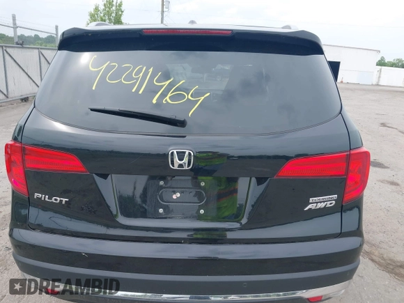 2017 Honda Pilot Touring with VIN 5FNYF6H90HB052474, listed as a IAAI auction lot 42291464 with 103,288 mi miles and . Bid and sale history available at DreamBid. Image 16.