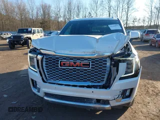 2021 GMC Yukon Denali with VIN 1GKS2DKL2MR458128, listed as a IAAI auction lot 41343876 with 64,732 mi miles. Bid and sale history available at carsss.com. Image 6.