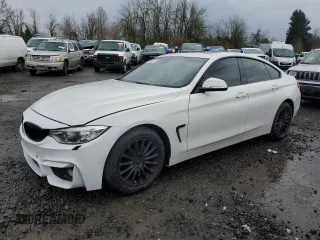 2015 BMW 4 Series 428i with VIN WBA4A5C51FG051622, listed as a Copart auction lot 46696205 with 67,140 mi miles and Salvage Title. Bid and sale history available at carsss.com. Image 1.
