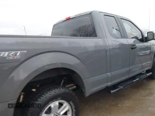 2018 Ford F-150 XL with VIN 1FTEX1EP1JFB25097, listed as a IAAI auction lot 41820009 with 137,138 mi miles and . Bid and sale history available at DreamBid. Image 13.