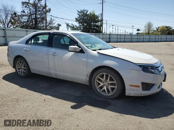2012 Ford Fusion SEL with VIN 3FAHP0JA0CR432748, listed as a Copart auction lot 52360485 with 168,542 mi miles and Salvage Title. Bid and sale history available at DreamBid. Image 4.