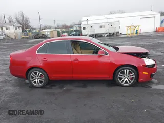 2006 Volkswagen Jetta 2.5L z VIN 3VWSF71KX6M681223, wystawiony jako IAAI lot #41645643 z przebiegiem 72 631 mil mil oraz . Historia ofert i sprzedaży dostępna na DreamBid. Obrazek 13.