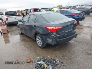 2019 Toyota Corolla L with VIN 5YFBURHE8KP873067, listed as a IAAI auction lot 41936471 with 75,076 mi miles and . Bid and sale history available at carsss.com. Image 3.