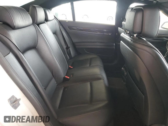 2013 BMW 7 Series 740i with VIN WBAYA6C5XDD143639, listed as a Copart auction lot 62296694 with 97,082 mi miles and Salvage Title. Bid and sale history available at carsss.com. Image 10.