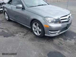 2012 Mercedes-Benz C-Class C 250 with VIN WDDGJ4HB1CF796936, listed as a IAAI auction lot 41466753 with 52,017 mi miles. Bid and sale history available at carsss.com. Image 1.