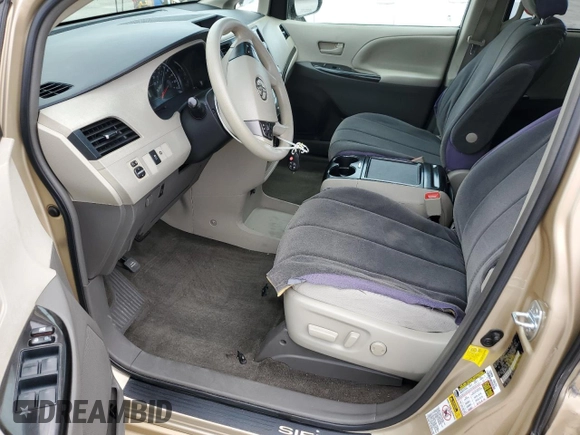 2012 Toyota Sienna LE AAS with VIN 5TDKK3DC5CS227808, listed as a Copart auction lot 57984515 with 103,656 mi miles and Salvage title. Bid and sale history available at DreamBid. Image 7.