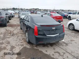2018 Cadillac ATS RWD z VIN 1G6AA5RX7J0183805, wystawiony jako IAAI lot #41398076 z przebiegiem 103 784 mil mil oraz . Historia ofert i sprzedaży dostępna na DreamBid. Obrazek 3.