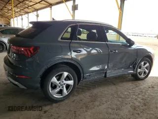 2020 Audi Q3 Premium with VIN WA1AECF34L1034797, listed as a Copart auction lot 51096385 with 74,192 mi miles and Salvage title. Bid and sale history available at DreamBid. Image 3.
