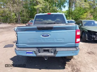 2023 Ford F-150 XL with VIN 1FTFW1E53PKD99214, listed as a IAAI auction lot 42211755 with 31 mi miles and . Bid and sale history available at DreamBid. Image 16.