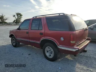 1996 Chevrolet Blazer z VIN 1GNCS13W7T2150216, wystawiony jako Copart lot #54006685 z przebiegiem 1 518 487 mil mil oraz Szkoda całkowita • Salvage title. Historia ofert i sprzedaży dostępna na DreamBid. Obrazek 2.