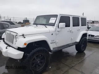 2016 Jeep Wrangler Unlimited Sahara with VIN 1C4HJWEG8GL240950, listed as a IAAI auction lot 41443059 with Not provided miles and . Bid and sale history available at DreamBid. Image 2.
