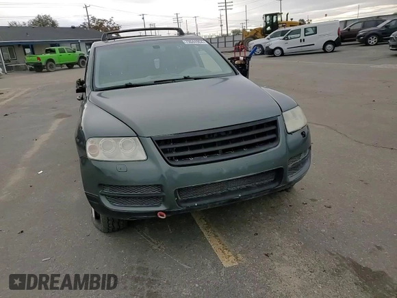 2004 Volkswagen Touareg with VIN WVGCM67L04D027410, listed as a Copart auction lot 79044964 with 100,509 mi miles and Salvage title. Bid and sale history available at DreamBid. Image 12.