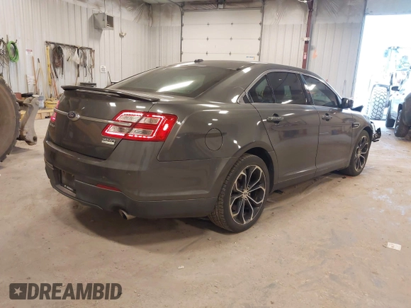2015 Ford Taurus SHO with VIN 1FAHP2KT2FG148691, listed as a IAAI auction lot 42033867 with 94,840 mi miles and . Bid and sale history available at DreamBid. Image 4.