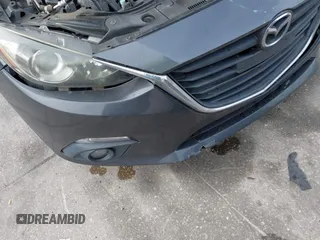 2015 Mazda 3 i Touring with VIN JM1BM1L79F1218498, listed as a IAAI auction lot 41876820 with 87,602 mi miles and . Bid and sale history available at carsss.com. Image 6.