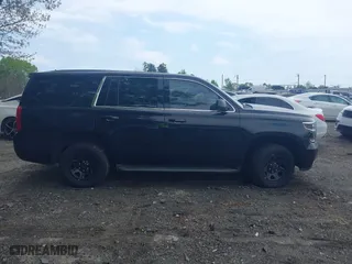 2019 Chevrolet Tahoe Commercial with VIN 1GNLCDECXKR208052, listed as a IAAI auction lot 42014348 with 96,455 mi miles. Bid and sale history available at carsss.com. Image 13.
