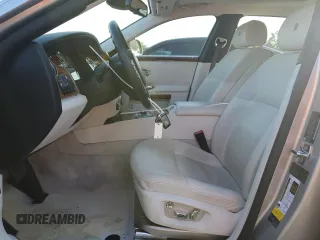 2012 Rolls-Royce Ghost z VIN SCA664L50CUX65544, wystawiony jako Copart lot #45107245 z przebiegiem 49 206 mil mil oraz Szkody całkowita. Historia ofert i sprzedaży dostępna na DreamBid. Obrazek 7.