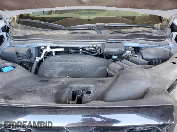 2023 Honda Passport Elite with VIN 5FNYF8H03PB034613, listed as a Copart auction lot 54009215 with 102,841 mi miles and Salvage title. Bid and sale history available at DreamBid. Image 12.