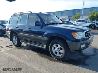 2000 Toyota Land Cruiser with VIN JT3HT05J3Y0098534, listed as a IAAI auction lot 41054858 with 336,520 mi miles. Bid and sale history available at carsss.com. Image 1.