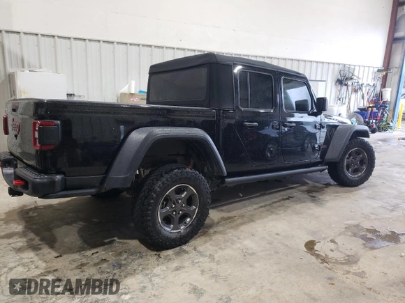2020 Jeep Gladiator Rubicon with VIN 1C6JJTBG9LL183888, listed as a Copart auction lot 70225794 with 57,969 mi miles and Salvage title. Bid and sale history available at DreamBid. Image 3.