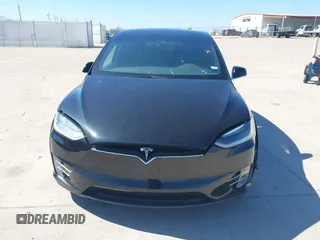 2017 Tesla Model X 90D z VIN 5YJXCAE28HF059140, wystawiony jako IAAI lot #41648518 z przebiegiem Nie podano mil oraz . Historia ofert i sprzedaży dostępna na DreamBid. Obrazek 6.