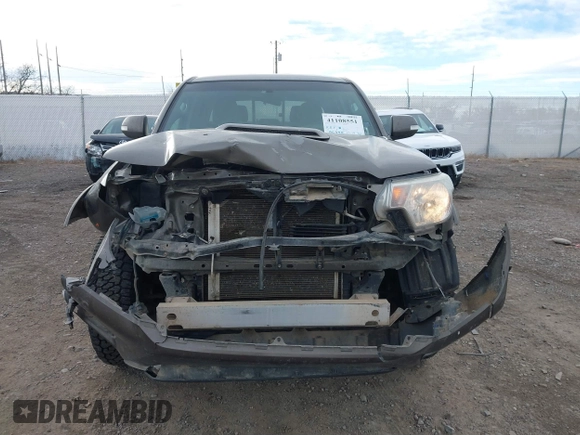 2014 Toyota Tacoma with VIN 3TMMU4FN7EM067182, listed as a IAAI auction lot 41108551 with 156,398 mi miles and . Bid and sale history available at DreamBid. Image 12.