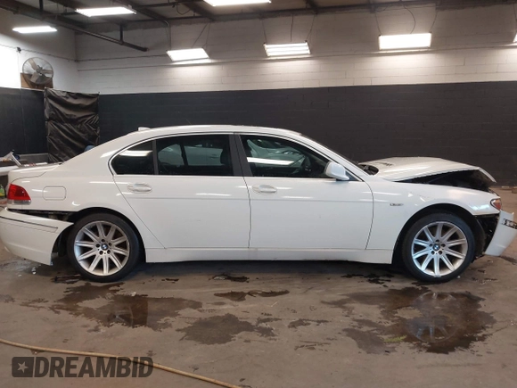 2003 BMW 7 Series 745Li with VIN WBAGN63463DR08268, listed as a IAAI auction lot 41355287 with 210,333 mi miles and . Bid and sale history available at DreamBid. Image 13.
