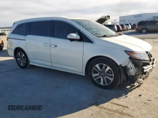 2017 Honda Odyssey Touring z VIN 5FNRL5H98HB018144, wystawiony jako Copart lot #84503884 z przebiegiem 85 437 mil mil oraz Szkoda całkowita • Salvage title. Historia ofert i sprzedaży dostępna na DreamBid. Obrazek 4.