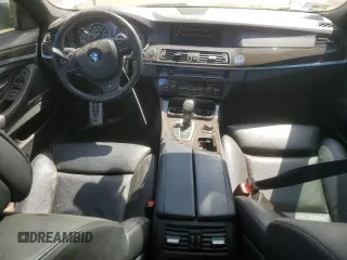 2013 BMW 5 Series 550i xDrive with VIN WBAFU9C52DDY71651, listed as a Copart auction lot 52156465 with 144,211 mi miles and Salvage title. Bid and sale history available at DreamBid. Image 8.