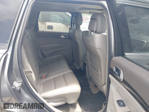 2011 Jeep Grand Cherokee Laredo with VIN 1J4RR4GG3BC595896, listed as a IAAI auction lot 42632333 with 135,426 mi miles and . Bid and sale history available at DreamBid. Image 8.