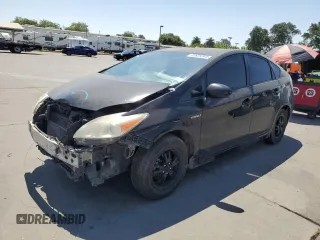 2012 Toyota Prius One z VIN JTDKN3DU2C5410797, wystawiony jako Copart lot #59929345 z przebiegiem 269 486 mil mil oraz Szkoda całkowita • Salvage title. Historia ofert i sprzedaży dostępna na DreamBid. Obrazek 1.